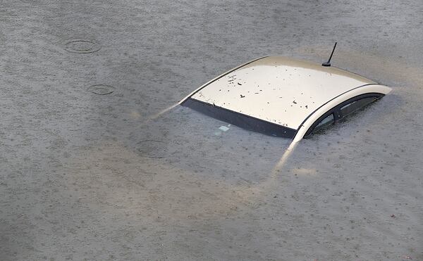 A submerged car on Interstate 610 North on August 27, 2017 in Houston as the city battles Tropical Storm Harvey and the resulting catastrophic flooding. 