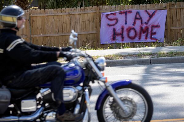  A not so welcoming sign greets visitors to Tybee Island on Highway 80 at the entrance to the island. Gov. Brian Kemp signed an executive order allowing people to exercise outside, with social distancing of at least 6 feet. (AJC Photo/Stephen B. Morton)