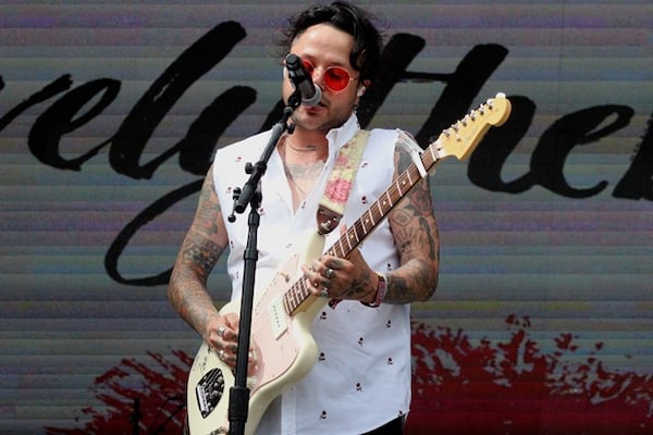 Singer Mitchy Collins of lovelytheband rocks the mic. Photo: Melissa Ruggieri/AJC