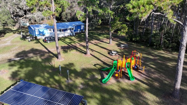 A playground, with a library in the background, is empty on Sapelo Island, Georgia on Tuesday, October 22, 2024. The small community of Gullah Geechee is in mourning. 
(Miguel Martinez / AJC)