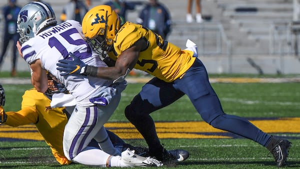 Tykee Smith had 114 tackles and 10.5 tackles -- including this one against Kansas State -- in two seasons playing the "spear" position at West Virginia.