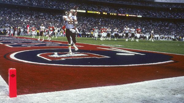 Washington tight end Clint Didier catches a touchdown pass during Super Bowl XXII against the Denver Broncos at Jack Murphy Stadium in San Diego in 1998.