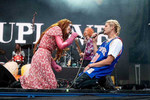 Hannah Hooper, left, and Chris Zucconi of Grouplove perform at the Shaky Knees Music Festival on Friday, May 5, 2023, at Central Park in Atlanta. (Photo by Paul R. Giunta/Invision/AP)