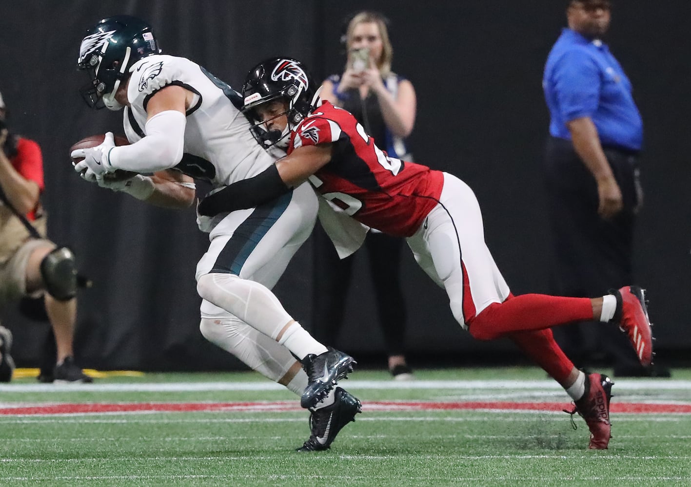 Photos: Falcons outlast Eagles for first win