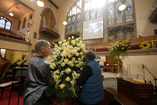 Flowers sent from Gladys Knight are delivered to The Abyssinian Baptist Church prior to a ceremony in celebration of Roberta Flack's life on Monday, March 10, 2025, in New York. (AP Photo/Richard Drew)