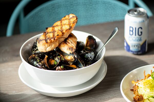 Steamed Mussels with white wine, shallots, garlic, and butter,  with Big Creek beer. Photo credit- Mia Yakel