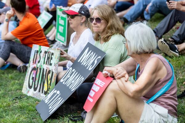 People gather in Piedmont Park before a rally organized by Georgia Moms Demand Action on Saturday, May 13, 2023. The rally was part of a national series of protests the day before Mother’s Day to highlight the mounting toll of gun violence.  (Steve Schaefer/steve.schaefer@ajc.com)