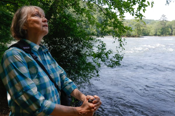 Now retired from Chattahoochee Riverkeeper, Sally Bethea enjoys the views of the river after hiking along East Palisades trail in Sandy Springs. (Natrice Miller/ natrice.miller@ajc.com)