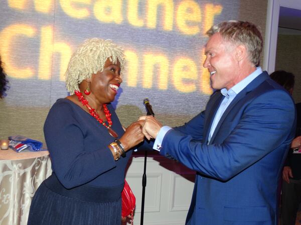 Sam Champion with Monica Pearson. CREDIT: Rodney Ho/rho@ajc.com