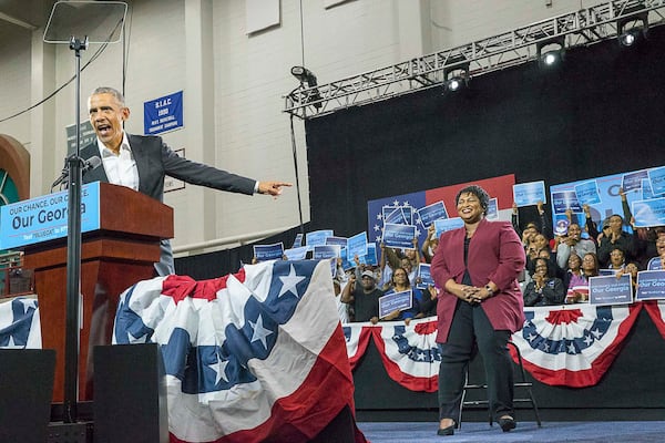 Former President Barack Obama and Stacey Abrams at a November rally in Atlanta.   (ALYSSA POINTER/ALYSSA.POINTER@AJC.COM)