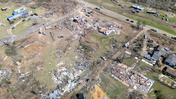 This image taken with a drone shows storm damage at the Lovelady Lane and Dallas County 63 interchange, Monday, March 17, 2025, in Plantersville, Ala, following deadly tornados that hit the area Saturday. (AP Photo/Vasha Hunt)