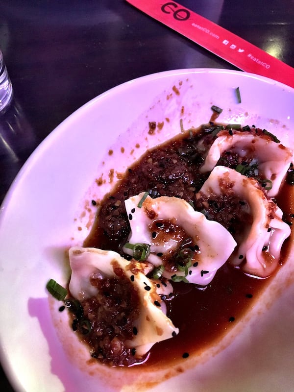 Beef and kimchi dumplings are served with a sambal chile broth at Co. CONTRIBUTED BY WYATT WILLIAMS