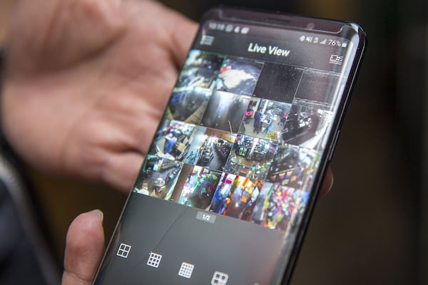 10/17/2019 — Atlanta, Georgia — An App installed in management’s phones at Red Pepper Taqueria in Buckhead shows the live transmission of surveillance video at all Red Pepper Taqueria locations, Thursday, October 17, 2019. Management is able to view the footage from each location from their phones in real time. (Alyssa Pointer/Atlanta Journal Constitution)