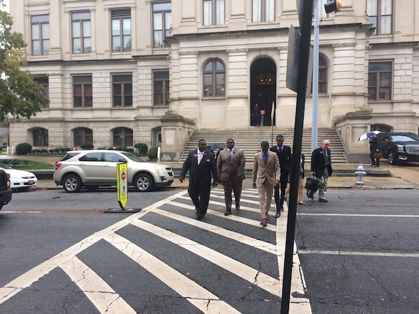 Photo from 2018 of people crossing Mitchell Street next to the Capitol. (Photo by Bill Torpy)