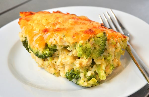 Cheesy Chicken Broccoli and Rice Casserole can be made with white rice or brown rice. STYLING BY JENNIFER ZYMAN / CONTRIBUTED BY CHRIS HUNT PHOTOGRAPHY