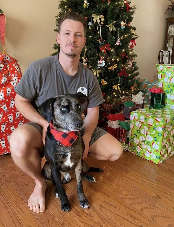 Michael Farmer with his dog, Bruce. The two were killed in a hit-and-run crash as they were out for a walk in Sandy Springs.