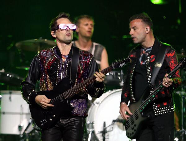 Muse rocked State Farm Arena for two hours on March 26, 2019. From left, Matt Bellemy, Dominic Howard (drums) and Chris Wolstenholme (bass).