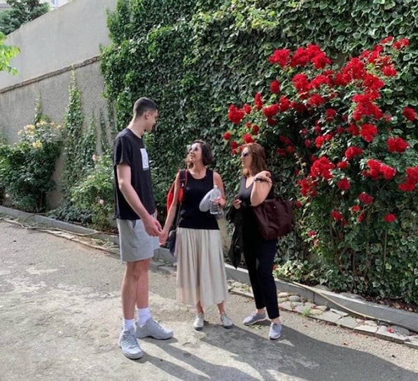 A family photo of Georgia Tech incoming freshman Saba Gigiberia with his mother Ia Tchumburidze (center) and aunt Nina Tchumburidze in the front yard of Gigiberia's home in Tbilisi, Georgia. "She means everything," Gigiberia said of his mother. (Photo courtesy Saba Gigiberia)