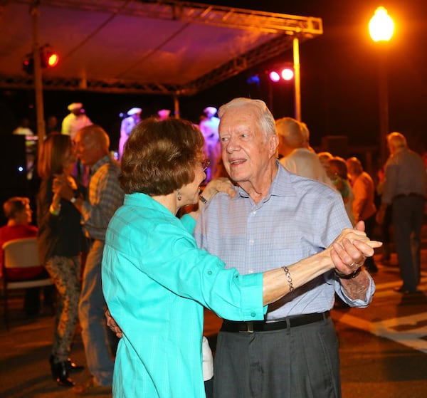 The Carters join in the Festival Dance on Main Street during the 18th Annual Plains Peanut Festival on Sept. 27, 2014. (Curtis Compton, ccompton@ajc.com)