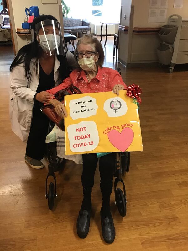 Dora Sowell and Dr. Elena Cabb, an Emory geriatrician. Sowell survived both the Spanish flu and COVID-19. She is 101 years old.CONTRIBUTED