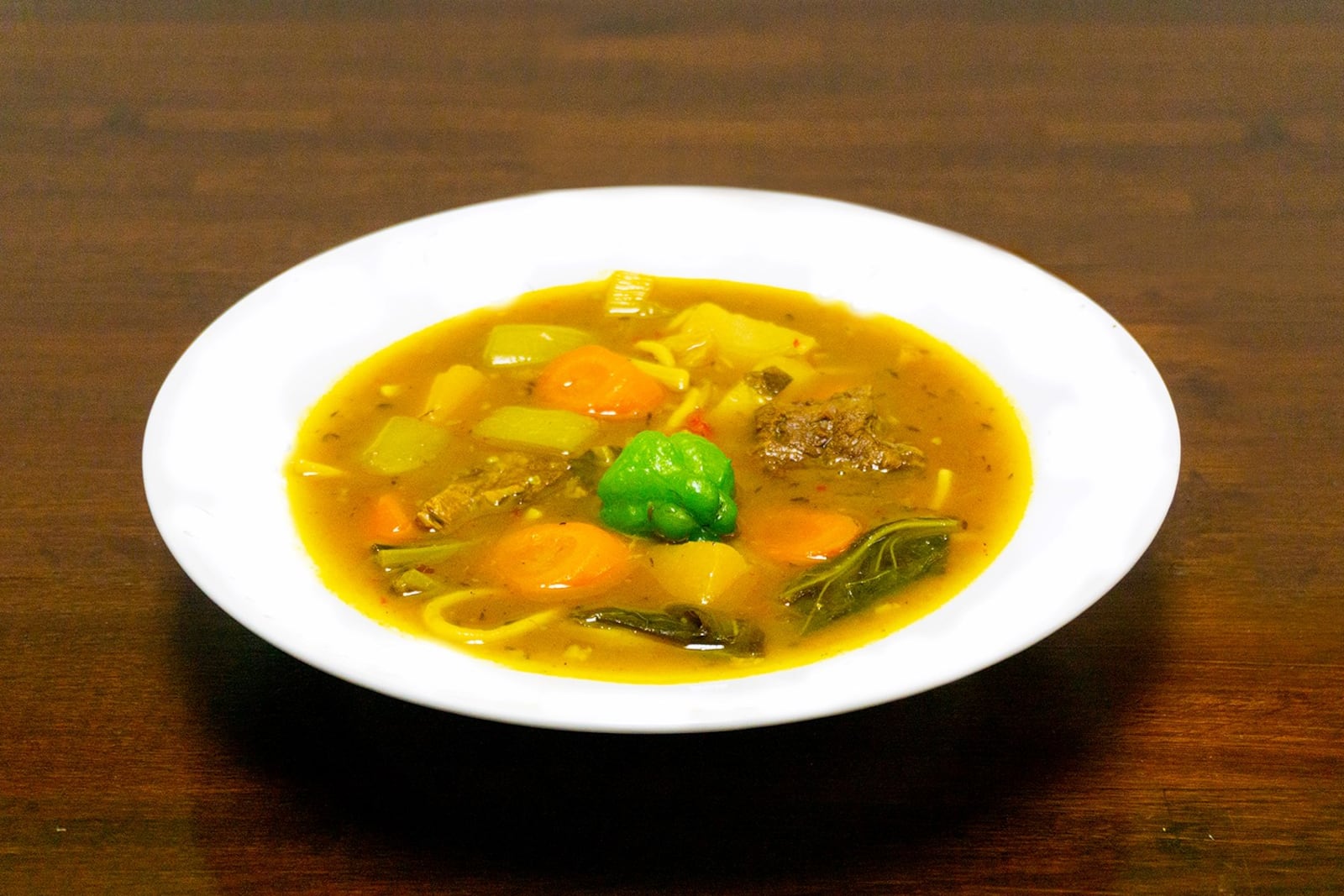 Soup joumou is served every Sunday at Jojo Fritay in Kennesaw; made with calabaza squash and butternut squash, the dish holds a special place in the hearts Haitians, who eat it on Haiti's Independence Day, Jan. 1. / 
Credit: Tercy Ugens Toussaint