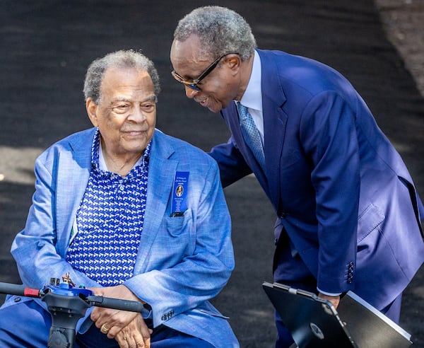 DeKalb CEO Michael Thurmond Right) talks to Ambassador Andrew Young during the statue unveiling ceremony honoring the late Congressman John Lewis in Decatur on Saturday, Aug 24, 2024. (Steve Schaefer / AJC)