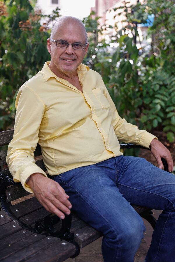 Eduardo Delgado from Miami, 64, poses for a photo at Marietta Square on Monday, July 15, 2024. (Natrice Miller/ AJC)