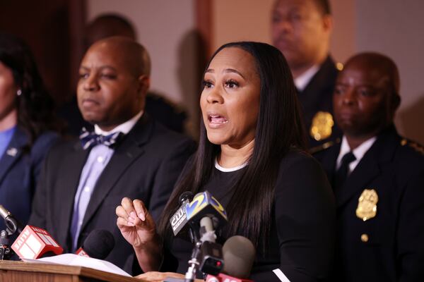 Fulton County District Attorney Fani Willis, accompanied by Police Chiefs from other agencies, spoke at a press conference about her dissatisfaction with the bond set by a Fulton County Judge. The Judge granted bond for an alleged gang member accused of shooting and seriously wounding an Atlanta police officer on Monday.
Wednesday, April 20, 2022. Miguel Martinez/miguel.martinezjimenez@ajc.com