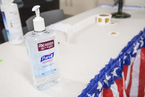 03/02/2020 — Sandy Springs, Georgia — Hand sanitizer is available for early voters at the Sandy Springs library early voting poll location in Sandy Springs, Monday, March 2, 2020. (ALYSSA POINTER/ALYSSA.POINTER@AJC.COM)