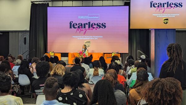 Arian Simone (center), co-founder and CEO of the Fearless Fund, answers questions during a keynote at the Fearless Moguls summit on Friday, Aug. 30, 2024 at The Gathering Spot in Atlanta.