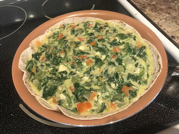 The Veggie Tortilla Pie that AJC dining editor Ligaya Figueras prepared for dinner with her aunt, who lives in a retirement community in Arizona. LIGAYA FIGUERAS / LFIGUERAS@AJC.COM