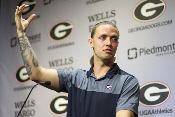 Georgia quarterback Carson Beck speaks to members of the media before the team's first day of spring football practice.