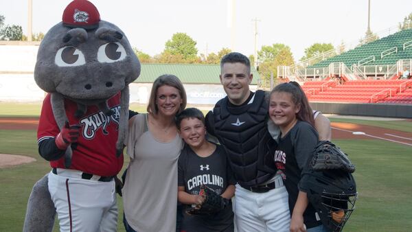 Tech. Sgt. Lance Daigle gave his son and daughter a surprise of a lifetime at a recent Carolina Mudcats game.