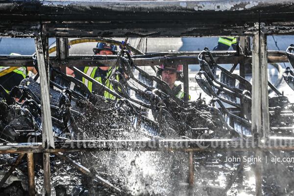 The bus caught on fire on I-285 near Paces Ferry Road.