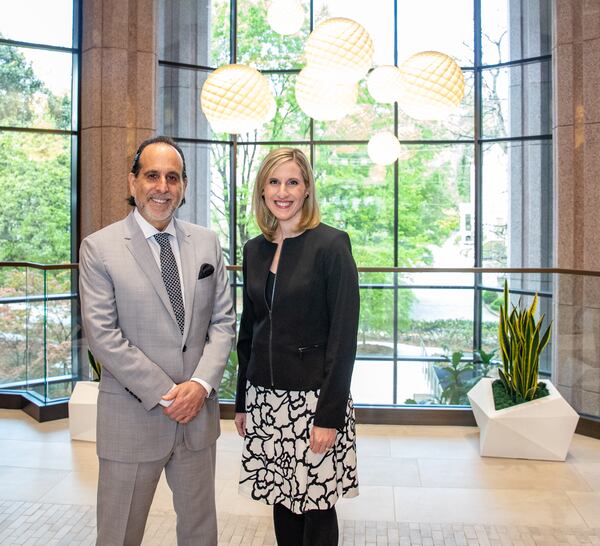 Attorneys Drew Findling, from left, and Marissa Goldberg are in the Findling Law Firm building lobby in Buckhead on Wednesday, March 29, 2023.  (Jenni Girtman for The Atlanta Journal-Constitution)