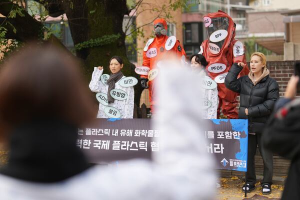 Environment activists shout slogans during a rally calling for a strong global plastics treaty ahead of the fifth session of the Intergovernmental Negotiating Committee on Plastic Pollution which set to be held in Busan from Nov. 25 to Dec. 1, in Seoul, South Korea, Wednesday, Nov. 20, 2024. (AP Photo/Lee Jin-man)