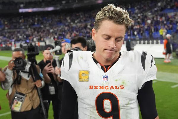 Cincinnati Bengals quarterback Joe Burrow pauses on the field after an NFL football game against the Baltimore Ravens, Thursday, Nov. 7, 2024, in Baltimore. The Ravens won 35-34. (AP Photo/Stephanie Scarbrough)