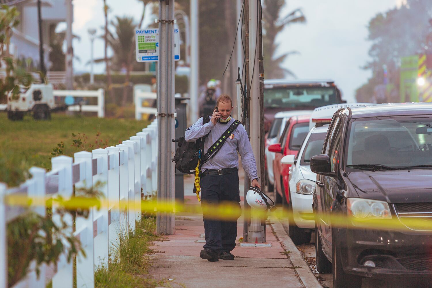 A rescue worker leaves the restricted area of the partially collapsed 12-story Champlain Towers South condo building in Surfside, Fla., Friday morning June 25, 2021. (Saul Martinez/The New York Times)