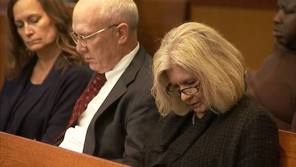 Dixie Martin, the sister of Tex McIver, follows a transcript of a phone call between them that was made when McIver was in prison. A recording of the call was played for the court during McIver's murder trial on April 9, 2018 at the Fulton County Courthouse. (Channel 2 Action News)