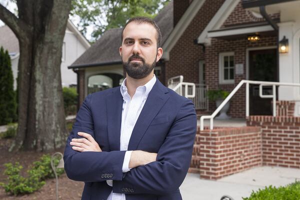 Restaurant owner Ryan Pernice in front of Osteria Mattone in downtown Roswell, June 19, 2019. (Alyssa Pointer/alyssa.pointer@ajc.com)