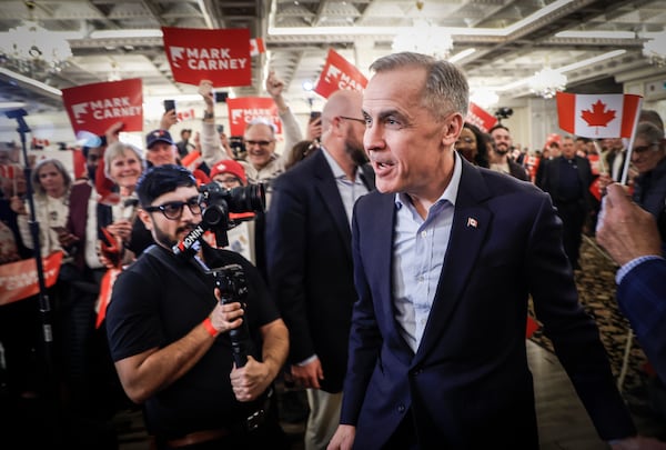 Liberal Party of Canada leadership candidate Mark Carney arrives to address supporters in Calgary, Alberta, Tuesday, March 4, 2025. (Jeff McIntosh/The Canadian Press via AP)