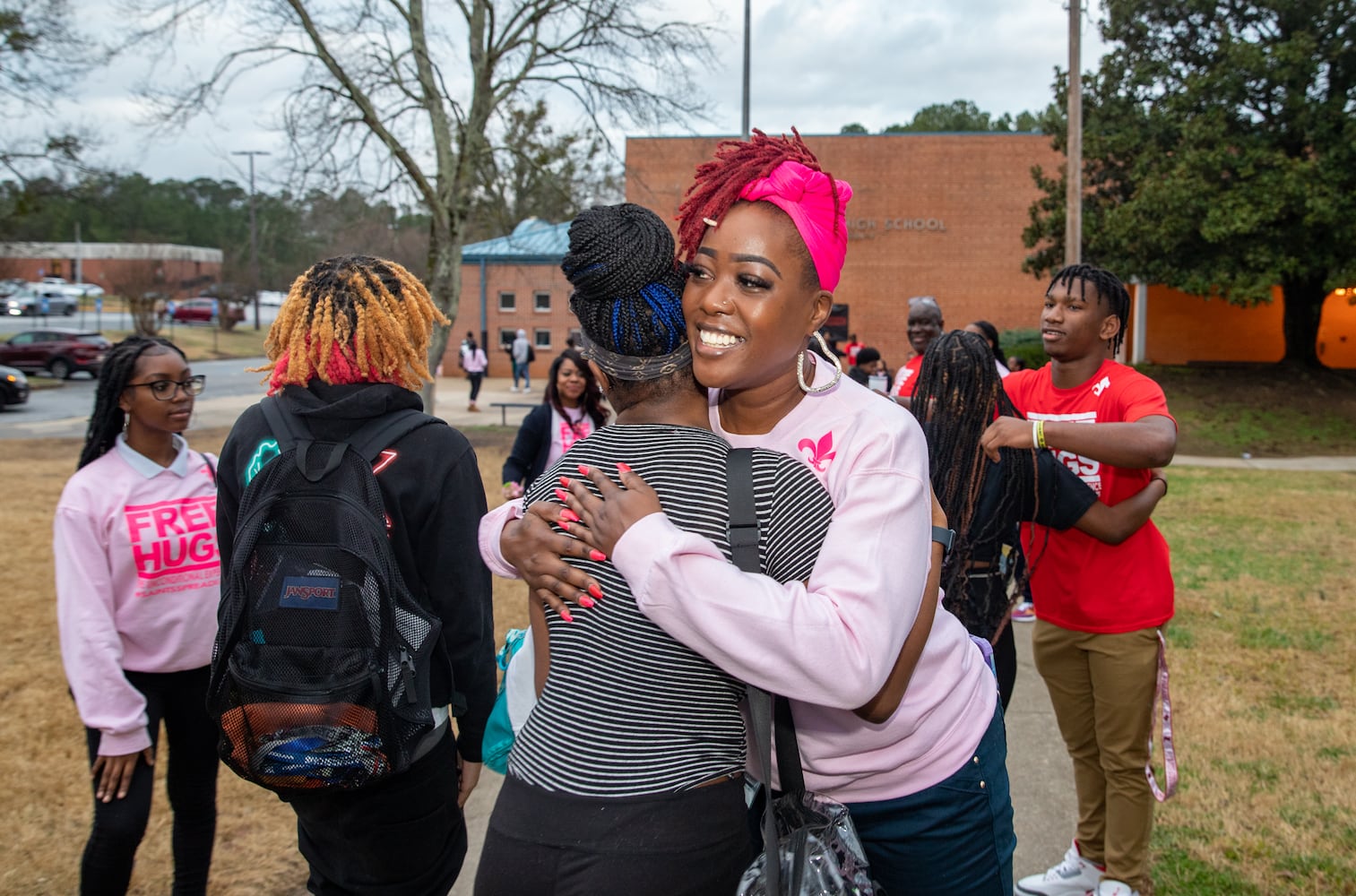 DeKalb County school hugs students every Wednesday on the way in to class