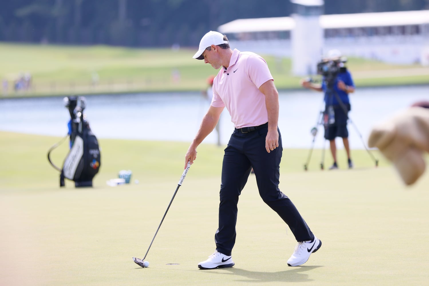 Roy Mcllroy works on his putting on the practice green before the final round of the Tour Championship at East Lake Golf Club, Sunday, Sept. 1, 2024, in Atlanta.
(Miguel Martinez / AJC)