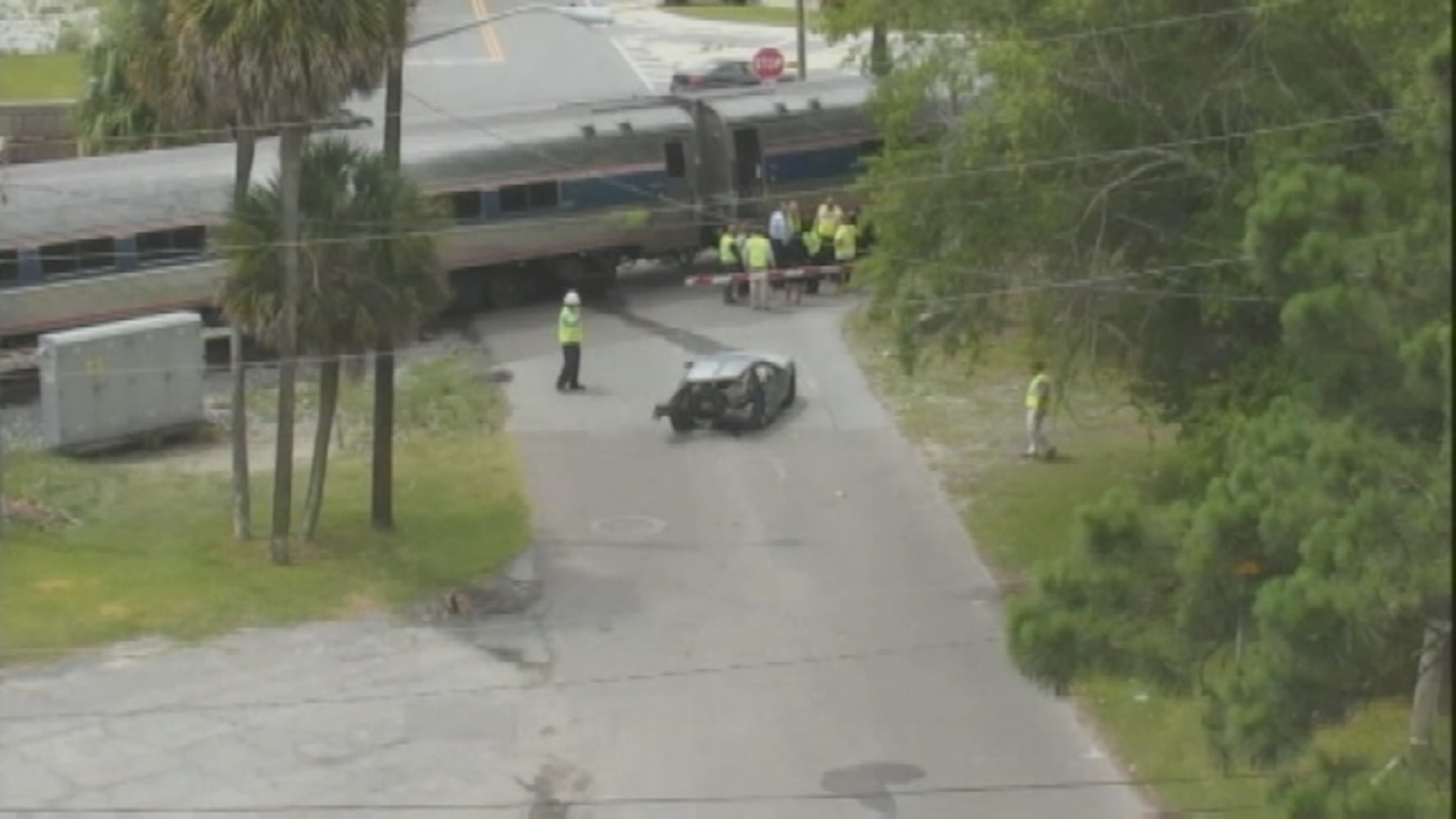 Amtrak train hits car on track