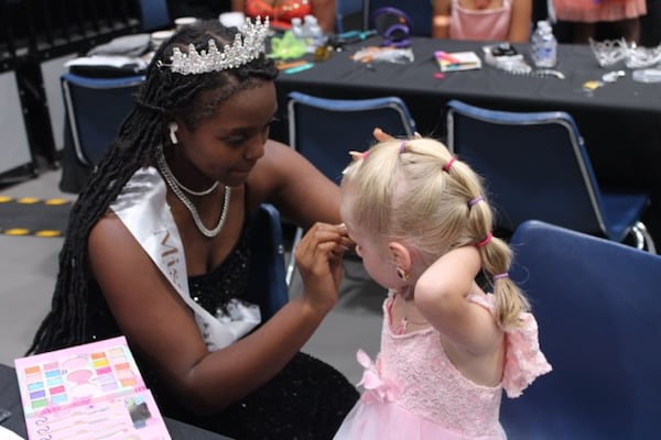 Participants prepare for the annual Down 7 Up 8 Boys to Men and Princess for a Day: Together As One event.
(Contributed by Down 7 Up 8)