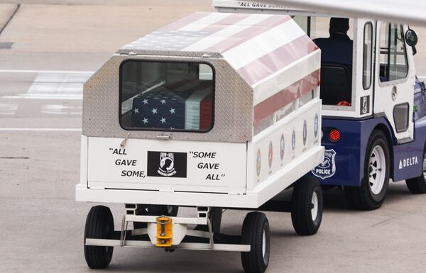 The body of Senior Airman Roger Fortson returns to Atlanta via Air Force dignified transfer at Hartsfield-Jackson International Airport on Tuesday, May 14, 2024. Fortson, a 23-year-old active-duty Senior Airman, was fatally shot by a Florida Sheriff’s Deputy on May 3. (Natrice Miller/ AJC)