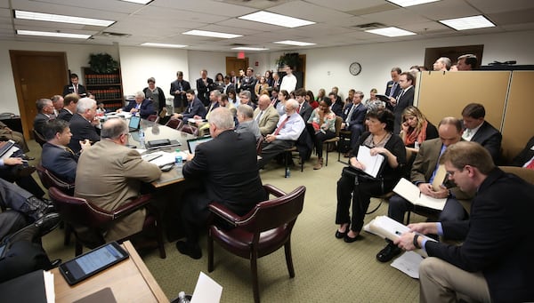 The committee room is full as state Rep. Jay Powell presents a bill for a digital tax to the House Ways and Means Subcommittee on Public Finance and Policy at the Georgia Capitol in February 2018. Georgia lawmakers are considering a tax on everything from Netflix to e-books, from internet phones to satellite TV service. Legislators say money raised for the tax would fund construction of rural internet lines. PHOTO / JASON GETZ