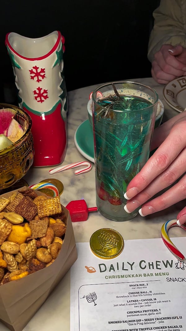 The Mani Cranny is a Chrismukkah play on an aperol spritz made with Jewish Manischewitz wine.