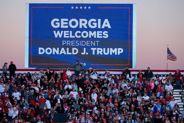 President Donald Trump's supporters packed into an airport in Rome before the president’s arrival for the campaign rally Sunday evening. Ben Gray for the Atlanta Journal-Constitution