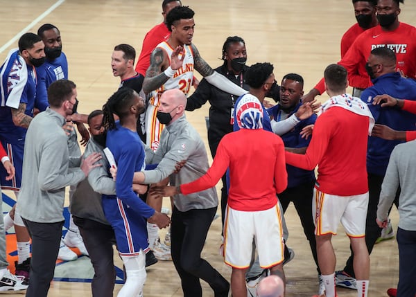 The New York Knicks and Atlanta Hawks exchange words at halftime during Game 5 of an NBA basketball first-round playoff series Wednesday, June 2, 2021, in New York. (Wendell Cruz/Pool Photo via AP)